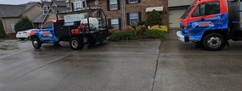 Pressure-washing concrete driveway